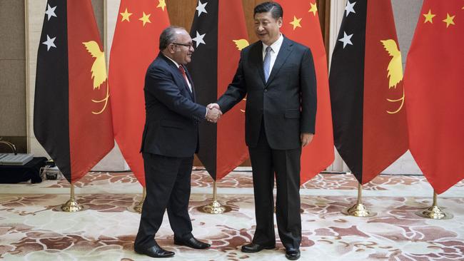 Everybody needs good neighbours: Papua New Guinea Prime Minister Peter O'Neill meets China's President Xi Jinping. Picture: Getty Images