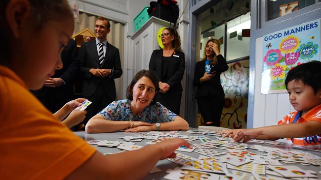 Premier Gladys Berejiklian with kindergarten class students during a visit to Penrith Public School in Penrith. Picture: AAP