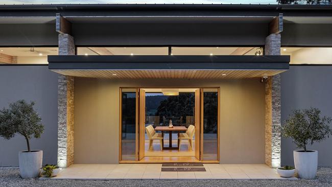 Tasmanian oak doors opens to an expansive living zone.