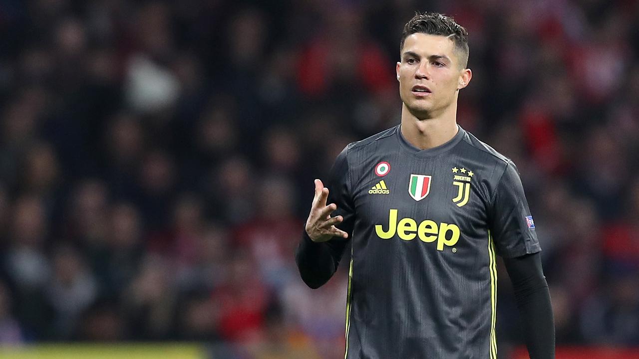 Cristiano Ronaldo of Juventus gestures towards Atletico Madrid fans