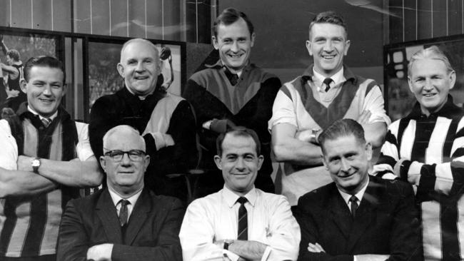 The Tony Charlton Footy Show panel in 1962: Back row (from left) Roy Simmonds, Jack Baggott, Denis Cordner, Jim Taylor and Harry Collier. Front row (from left): Bert Hyde, host Tony Charlton and Norm Smith.