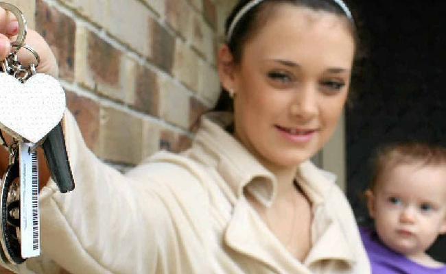 Alice Hodgkinson (with her daughter Piper Lloyd) is ready to open the door to her own home. Picture: Candyce Braithwaite