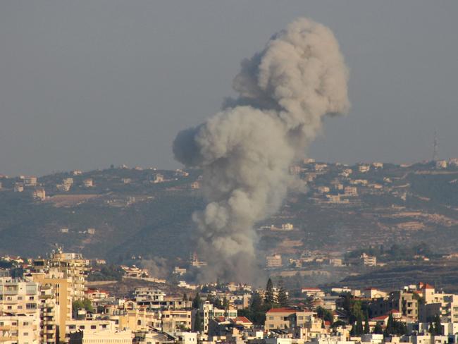 Smoke billows after an Israeli airstrike that targeted the southern Lebanese village of Abbasiyeh on September 24, 2024. Israel announced dozens of new air strikes on Hezbollah strongholds in Lebanon, a day after 558 people, including 50 children, were killed in the deadliest day of violence since the Lebanese civil war. (Photo by Kawnat HAJU / AFP)