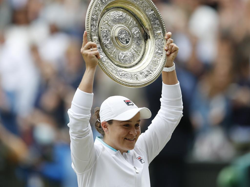 Ash Barty lifts the Venus Rosewater Dish trophy. Picture: Peter Nicholls/Getty