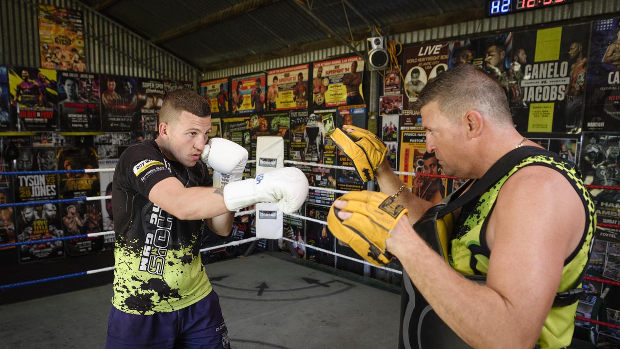 Toowoomba boxer Adam Flood with his trainer Brett Richards ahead of his fight for the WBA Oceania Welterweight championship in Sydney. Picture: Kevin Farmer