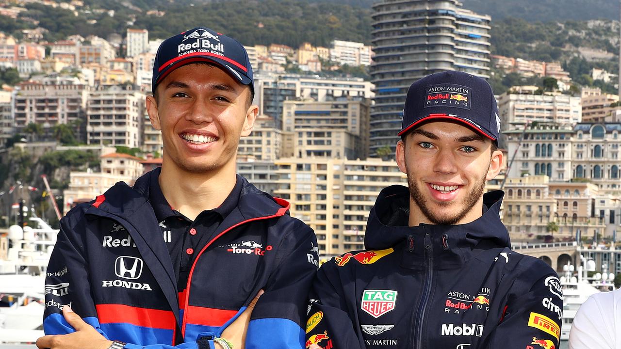 Happier times: Albon and Gasly pose during a promotional event at Monaco in May.