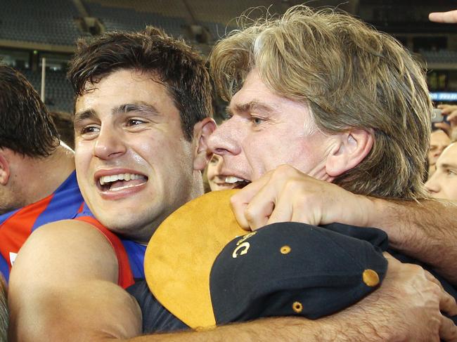 Gary Ayres with Nathan Batsanis after the 2011 grand final.