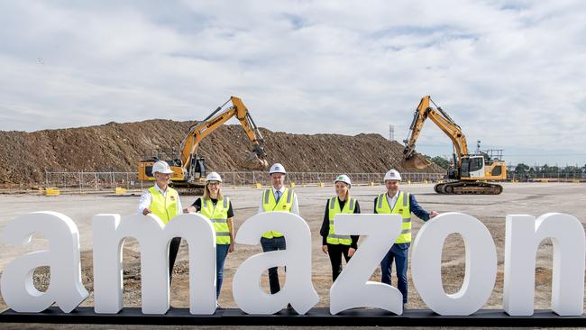 Minister for Roads John Graham, Amazon Australia’s country manager Janet Menzies, NSW Premier Chris Minns, Goodman general manager for western sydney developments Stephanie Partridge and Planning Minister Paul Scully at the future fulfilment site.