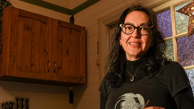 Georgina Johanson, a retired registered nurse of Lismore, was cleaning what she thought were cobwebs only to have wood split and burst with termites.