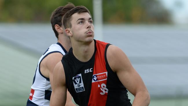 Rookie ruckman Sam Draper takes front spot in a ruck contest during a VFL match against Geelong. Picture: AAP/ Chris Eastman. 