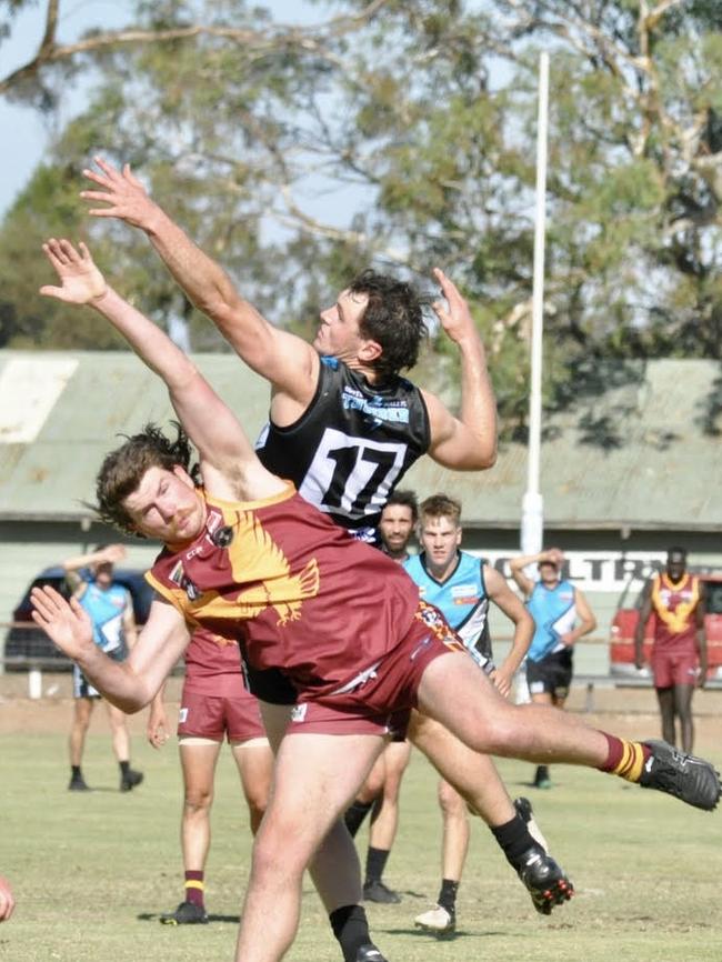 Southern Mallee Thunder's Sam White and Warrack Eagles' Charlie Dean compete for the ball in the Wimmera league season opener. Picture: Georgia Hallam