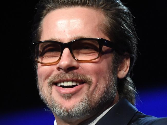 Brad Pitt starts up bizarre singalong on stage