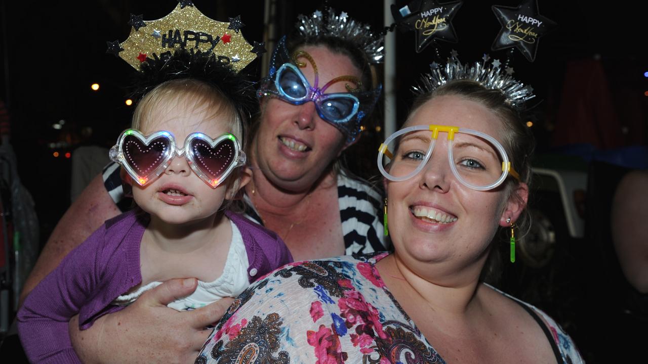 2012 New Year’s Eve: Lauren (2) and Christine Fox and Pamela Parfitt from Ipswich. Photo: Alistair Brightman