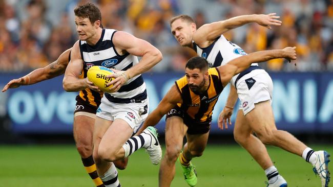 Patrick Dangerfield and Joel Selwood in action against Hawthorn.