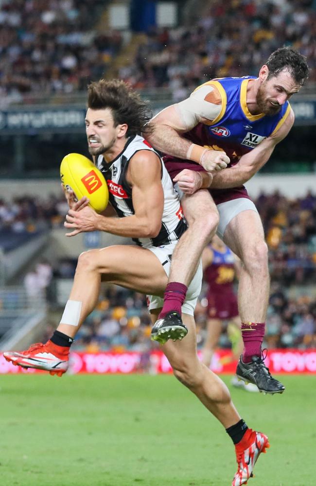 Lion Darcy Gardiner has avoided suspension for this hit on Josh Daicos. Picture: AFL Photos/Getty Images