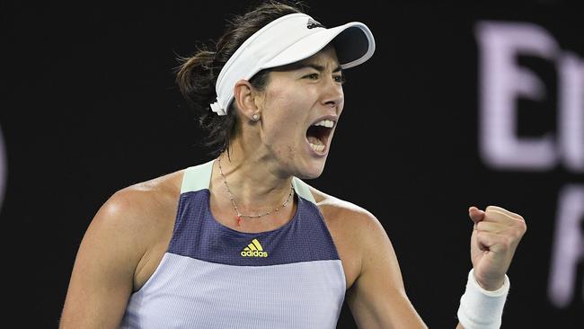 Spain's Garbine Muguruza is elated after taking the first set against Sofia Kenin.