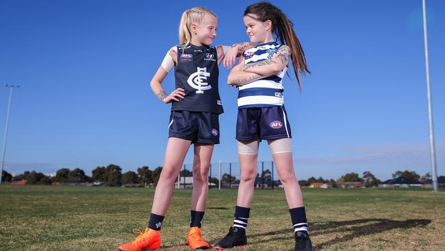 Alyssa, 8, as Tayla Harris and Grace, 8, as Richelle Cranston. Picture: Wayne Taylor