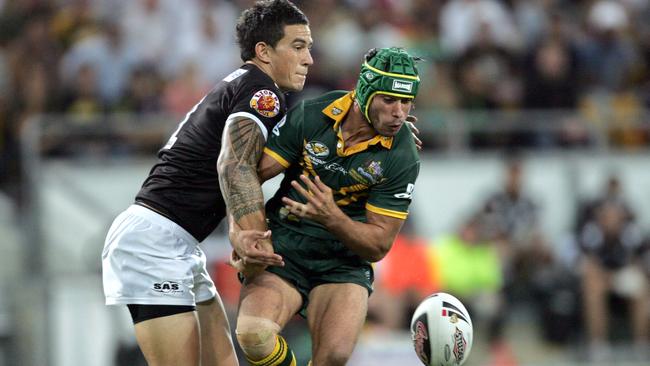 Sonny Bill Williams flattens Johnathan Thurston in a Test. Picture: Gregg Porteous