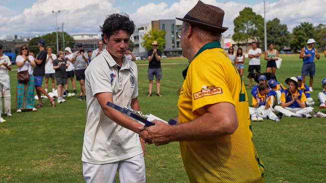 Craig Shield: Darcy Aitken accept the Aitken Trophy as best on ground. Picture: Valeriu Campan