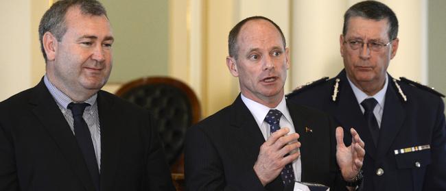 Then-Queensland Premier Campbell Newman (centre) and Police Minister Jack Dempsey (left) along with Queensland Police Commissioner Ian Stewart in 2013 (AAP Image/Dan Peled)