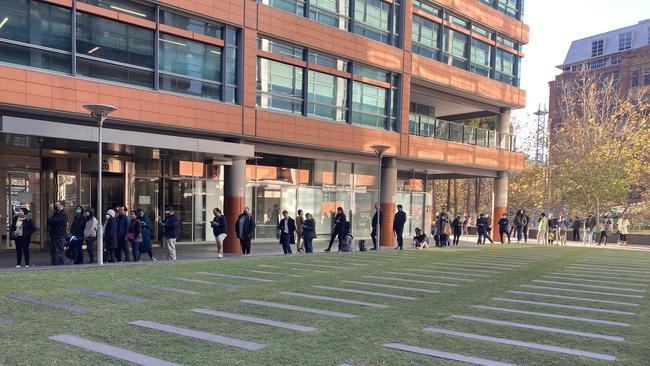 Photos capture the lengthy lines curling around government buildings in Melbourne and Sydney over the past three days. Picture: Nicholas Eagar/NCA NewsWire.