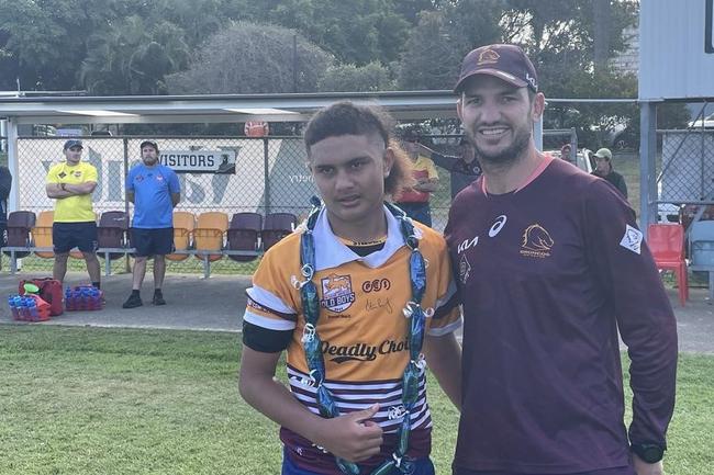 Jesse-James Schuster is presented his Renouf Shield (Year 9) player of the match award from Matt Gillett in 2023's school final against Ipswich State High.