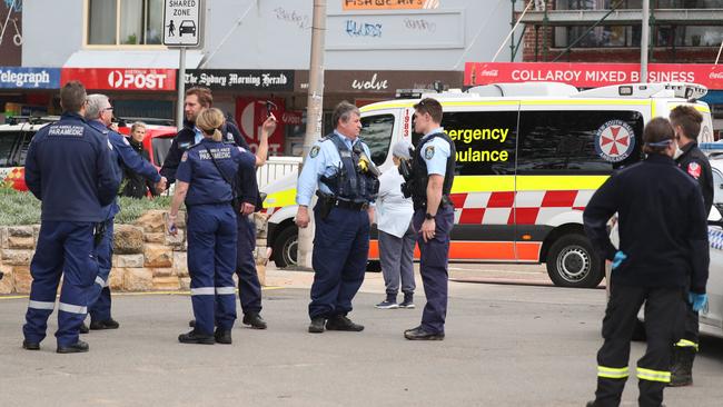 A man, aged about 40, was pulled unconscious from the massive surf at Collaroy Beach, after being knocked from his surfboard and being pushed under a large stormwater pipe by the large swell. He was rushed to hospital, under police escort, in a critical condition. Picture John Grainger