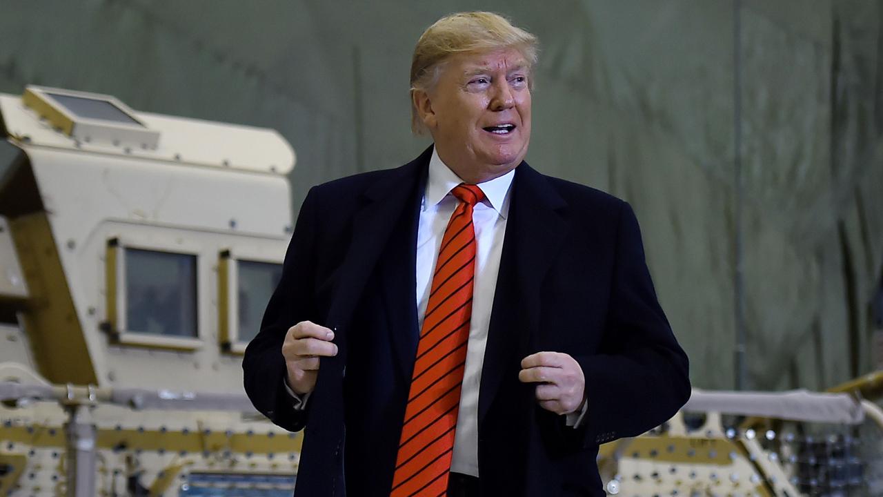 US President Donald Trump speaks to the troops during a surprise Thanksgiving day visit last year in Afghanistan. Picture: Olivier Douliery/AFP