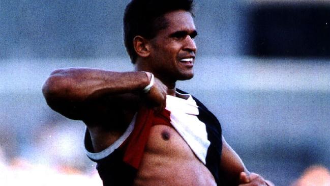 Nicky Winmar lifts his jumper and proudly shows off his skin colour in 1993.