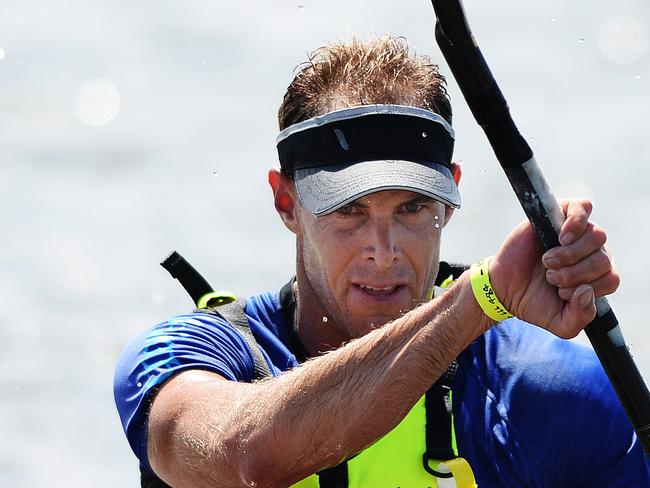 Tim Jacobs pictured coming in to the finish line during the 20 Beaches Ocean Classic paddle race at Palm Beach. Picture: Braden Fastier.