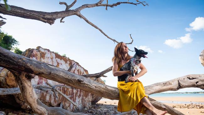 Leah Sanderson is our next candidate for Why I Love the NT. She is pictured here at her favorite beach, Mindil Beach and her pup Kalki. Picture: Che Chorley