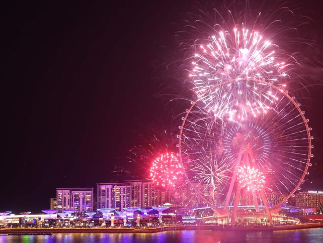 Fireworks erupting in front of Ain Dubai as part of the New Year's festivities in the Gulf emirate of Dubai. Picture: AFP)