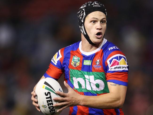 Kalyn Ponga of the Knights runs the ball during the Round 21 NRL match between the Newcastle Knights and the Wests Tigers at McDonald Jones Stadium in Newcastle, Friday, August 3, 2018. (AAP Image/Brendon Thorne) NO ARCHIVING, EDITORIAL USE ONLY