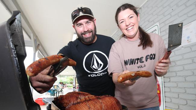 Damage from the storms that brought tornados and flooding rains to Mt Tamborine. Local butcher Stuart and Chelsea Bray cooking up free food for the locals to keep their spirits up. . Picture: Glenn Hampson