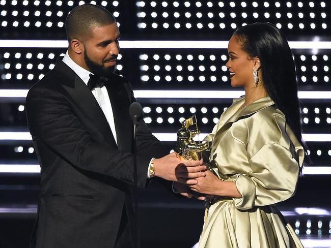 FILE - In this Aug. 28, 2016, file photo, Drake, left, presents the Michael Jackson Video Vanguard Award to Rihanna at the MTV Video Music Awards at Madison Square Garden in New York. Rihanna thanked Drake on Instagram Friday, Sept. 2, 2016, for his presentation, calling the rapper's speech 