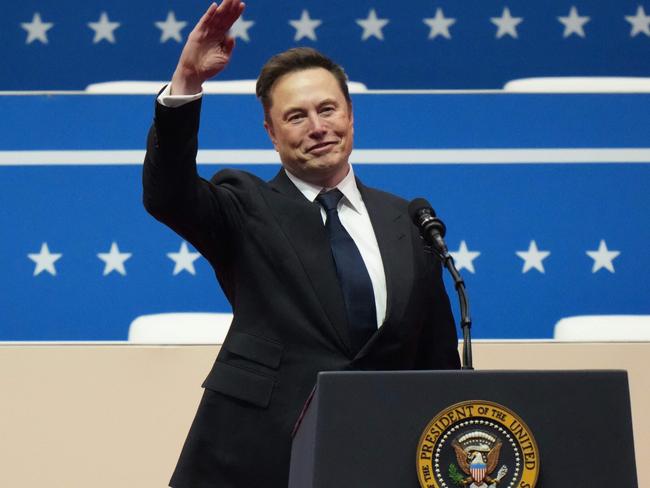 WASHINGTON, DC - JANUARY 20: Tesla, SpaceX and X CEO Elon Musk gestures while speaking during an inauguration event at Capital One Arena on January 20, 2025 in Washington, DC. Donald Trump takes office for his second term as the 47th president of the United States.   Christopher Furlong/Getty Images/AFP (Photo by Christopher Furlong / GETTY IMAGES NORTH AMERICA / Getty Images via AFP)