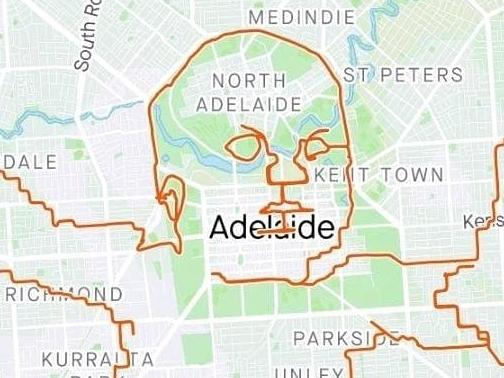 Strava artist Pete Stokes recreated the naked Nirvana baby on the streets of Adelaide. Picture: Facebook