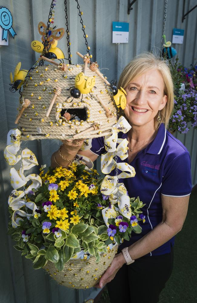 Gayle Gardiner representing Glenvale Villas, the Community category winner of Cobb and Co Hanging Basket Display of Toowoomba's Carnival of Flowers. Picture: Kevin Farmer