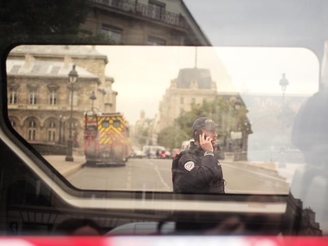 A police officer near Paris police headquarters. Picture: AP