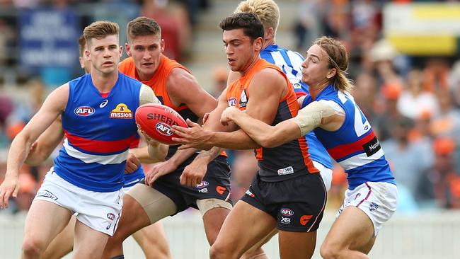 Tim Taranto tries to break out of a tackle. Picture: Getty Images