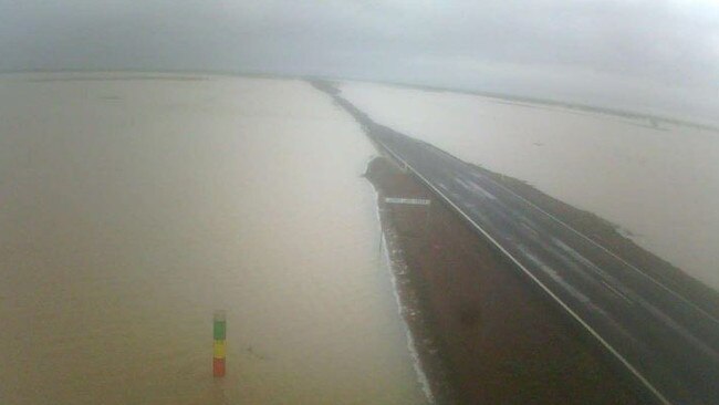 A Carpentaria Shire flood camera showing flooding over a road at Jenny Lind Creek near Normanton in Gulf Country this morning.