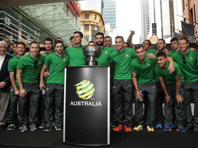 SYDNEY, AUSTRALIA - FEBRUARY 01: Socceroos players pose with the Asian Cup during celebrations at Westfield Sydney on February 1, 2015, after the Socceroos won the 2015 Asian Cup last night, in Sydney, Australia. (Photo by Mark Metcalfe/Getty Images)