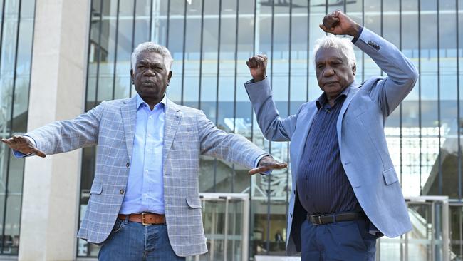 Gumatj leaders Djawa Yunupingu and Balupalu Yunupingu celebrate outside the High Court in Canberra last Wesnesday. Picture: AAP Image/Mick Tsikas