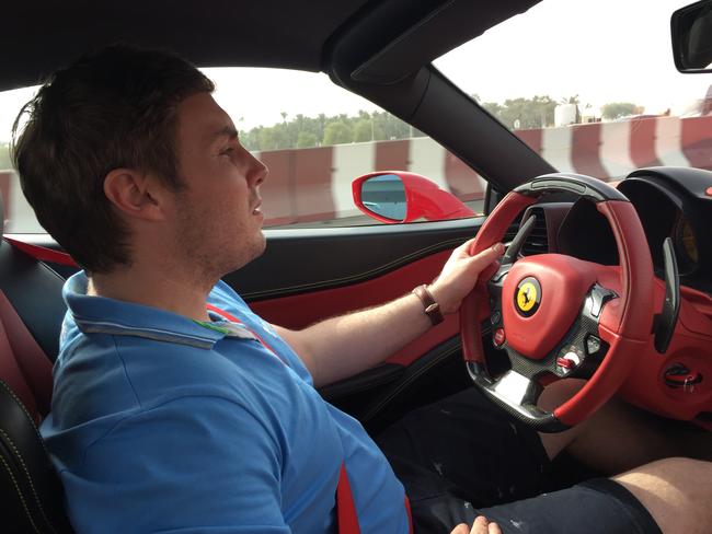 Adam Cranston, behind the wheel of a Ferrari, was a car fanatic.