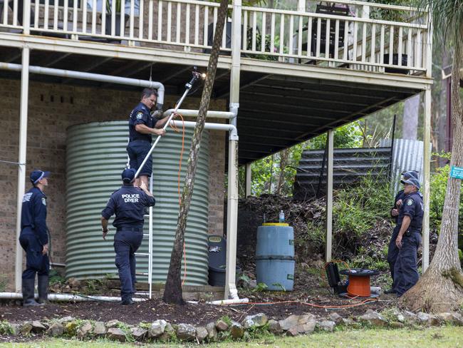 Police divers scour water tanks at Tyrrell house