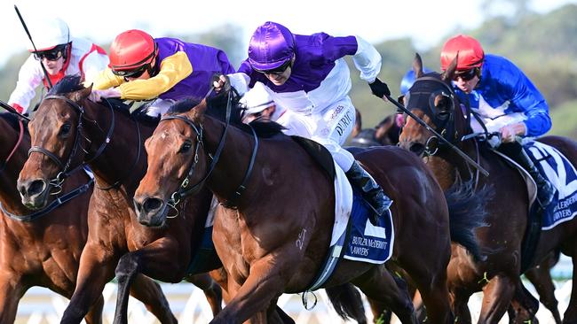 Vlad Duric urges Xidaki home in the Group 3 Winx Guineas at the Sunshine Coast on Sunday. Picture: Grant Peters/Trackside Photography