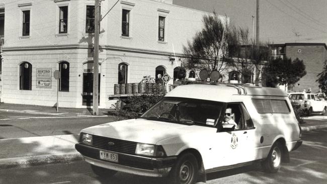 A police car checks the area around a Painters and Dockers pub during the height of the Royal Commission into the union.