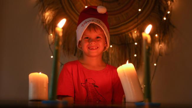 Ezekiel Ridley ready for carols by candlelight. Picture: GLENN CAMPBELL