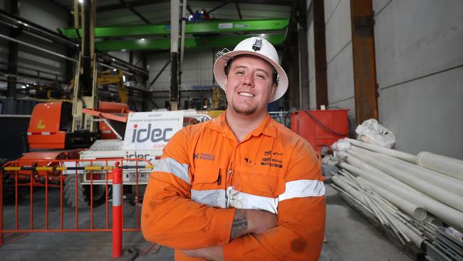 Young apprentice Adam Wormald. has swapped working in child care for an apprenticeship on Cross River Rail. Pic Peter Wallis