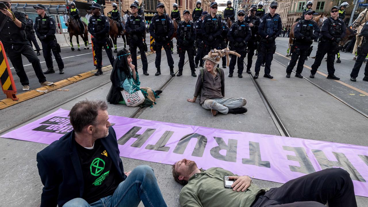 Extinction Rebellion activists shut down tram services in Melbourne’s CBD. Picture: Jake Nowakowski